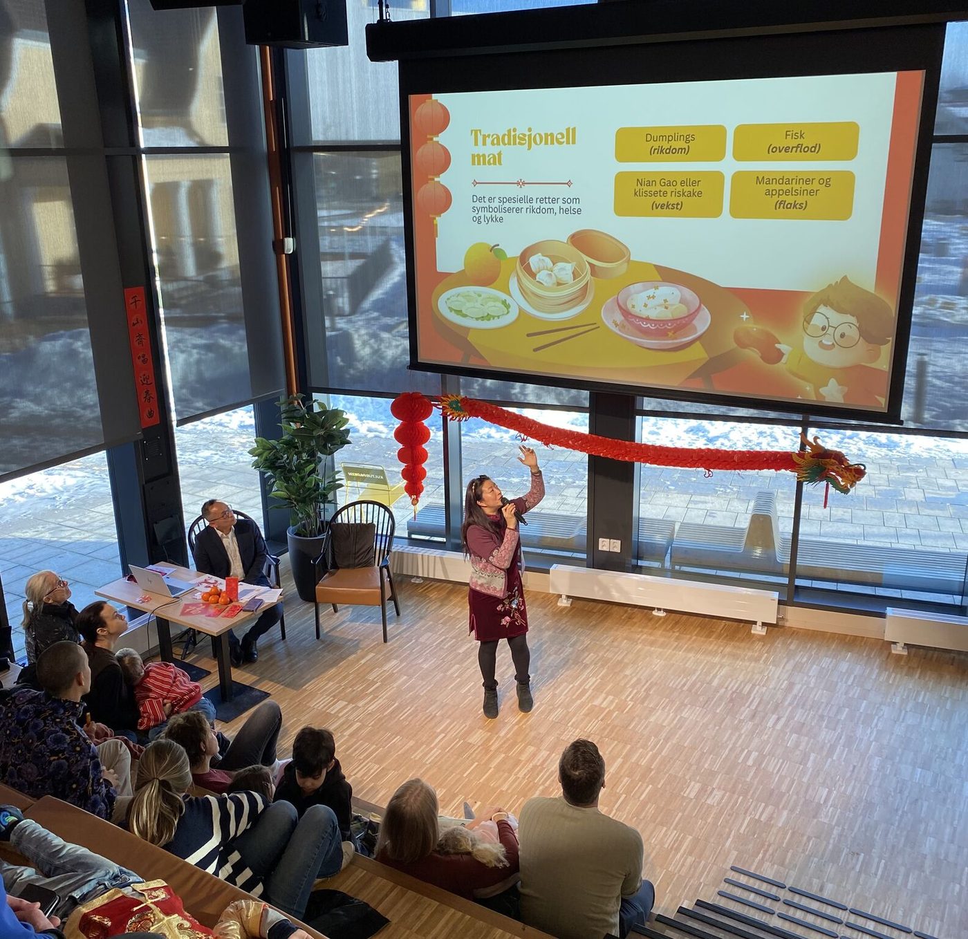 Adrienne presenting at Chinese New Year 2025